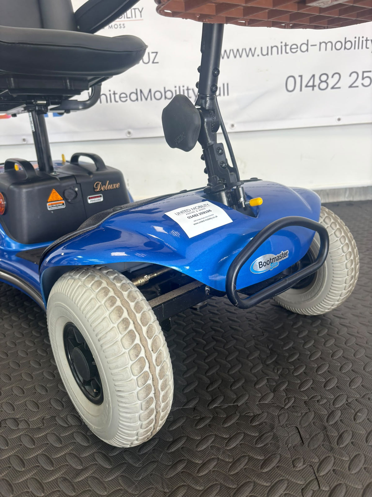 Eden Bootmaster mobility scooter front with blue body and two pale tires