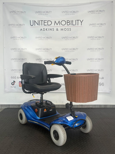 Blue Eden Bootmaster mobility scooter with black seat and brown front basket