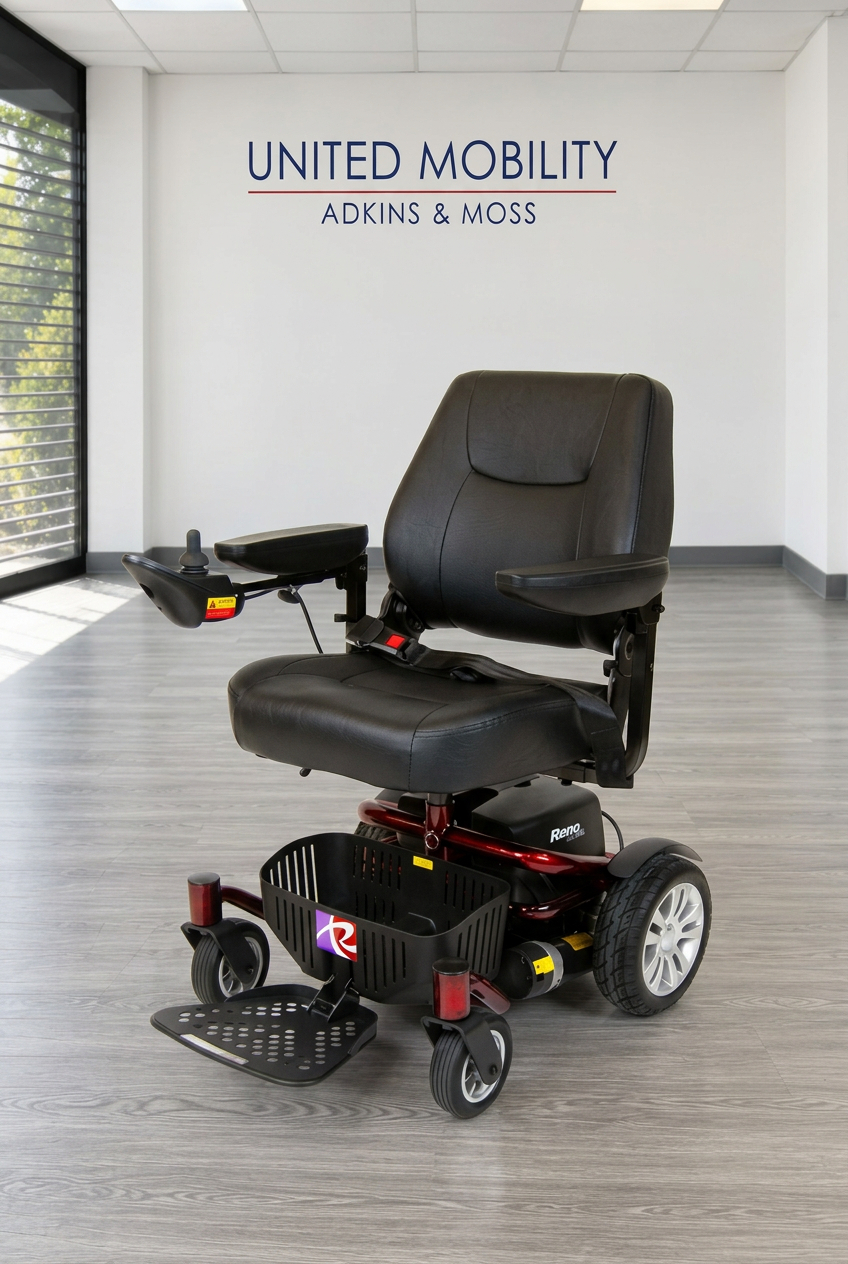New Reno 4mph power chair with black seat, front basket, joystick controls and red frame