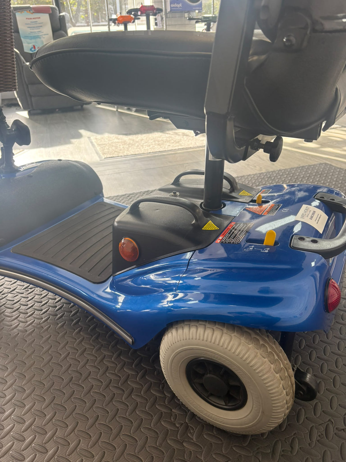 Blue Eden Bootmaster mobility scooter with padded seat, tiller, floorboard and large wheels