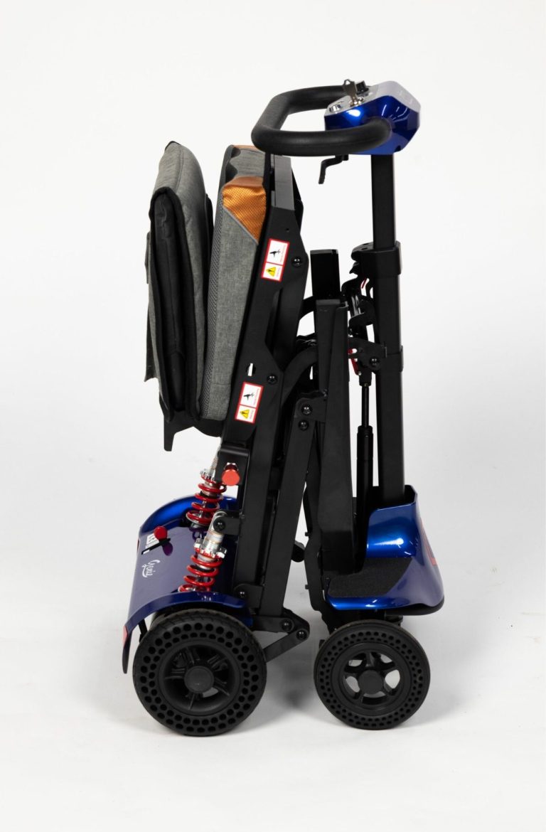 A compact, foldable mobility scooter in dark grey with black wheels.
